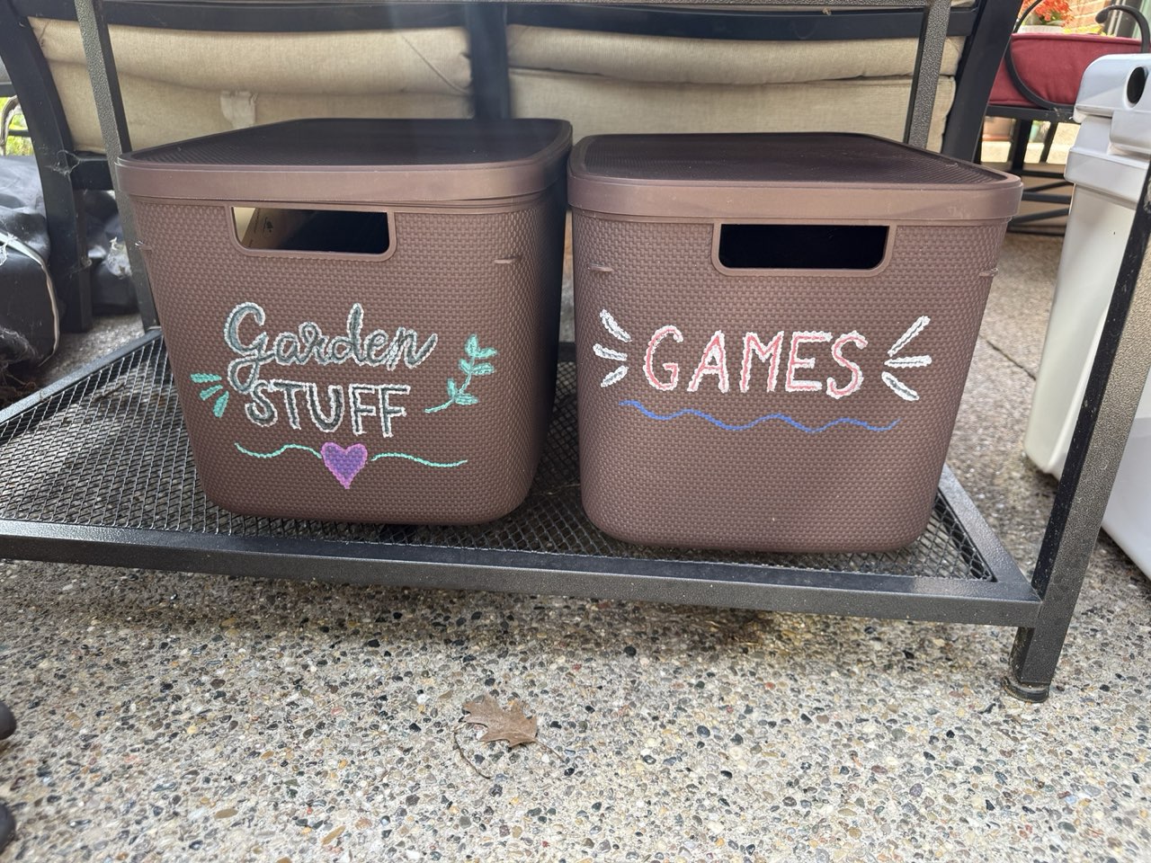 Hand-lettered “Garden Stuff” and “Games” storage bins